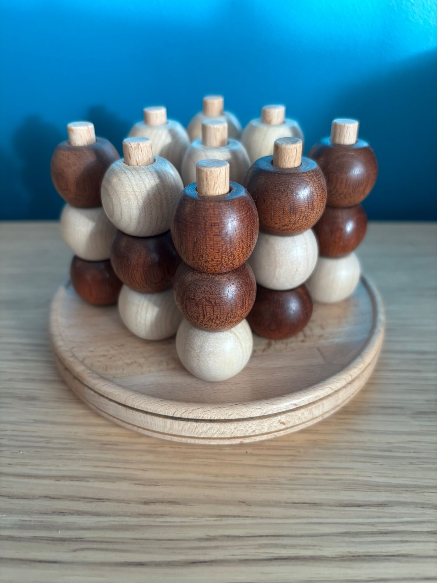 Artisan using lathe in woodworking workshop